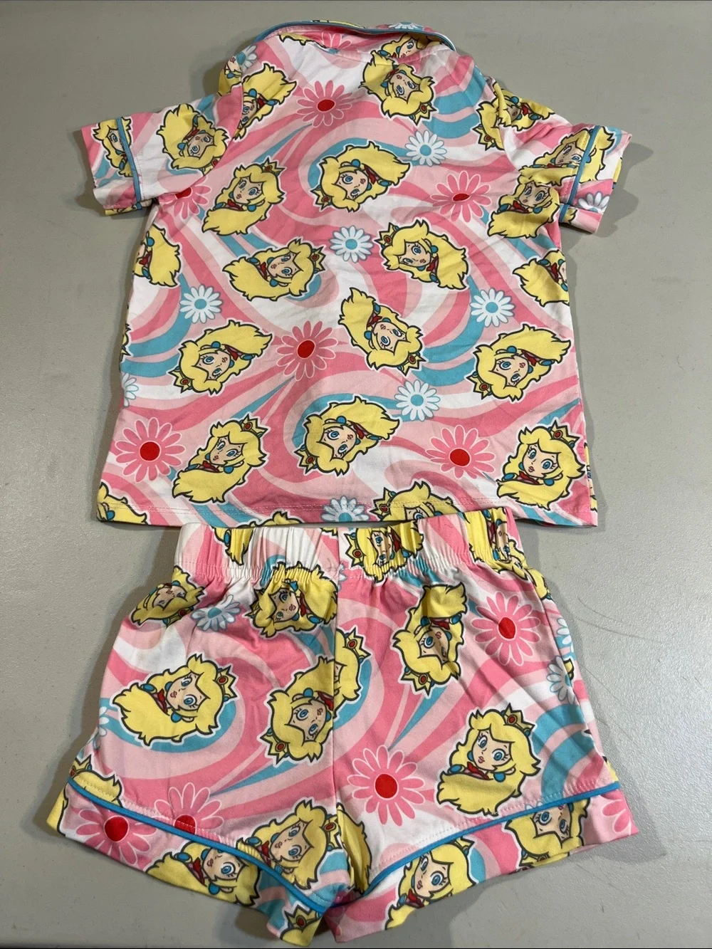 Girls Pink Printed Short Pajama Set with Yellow Character Accents